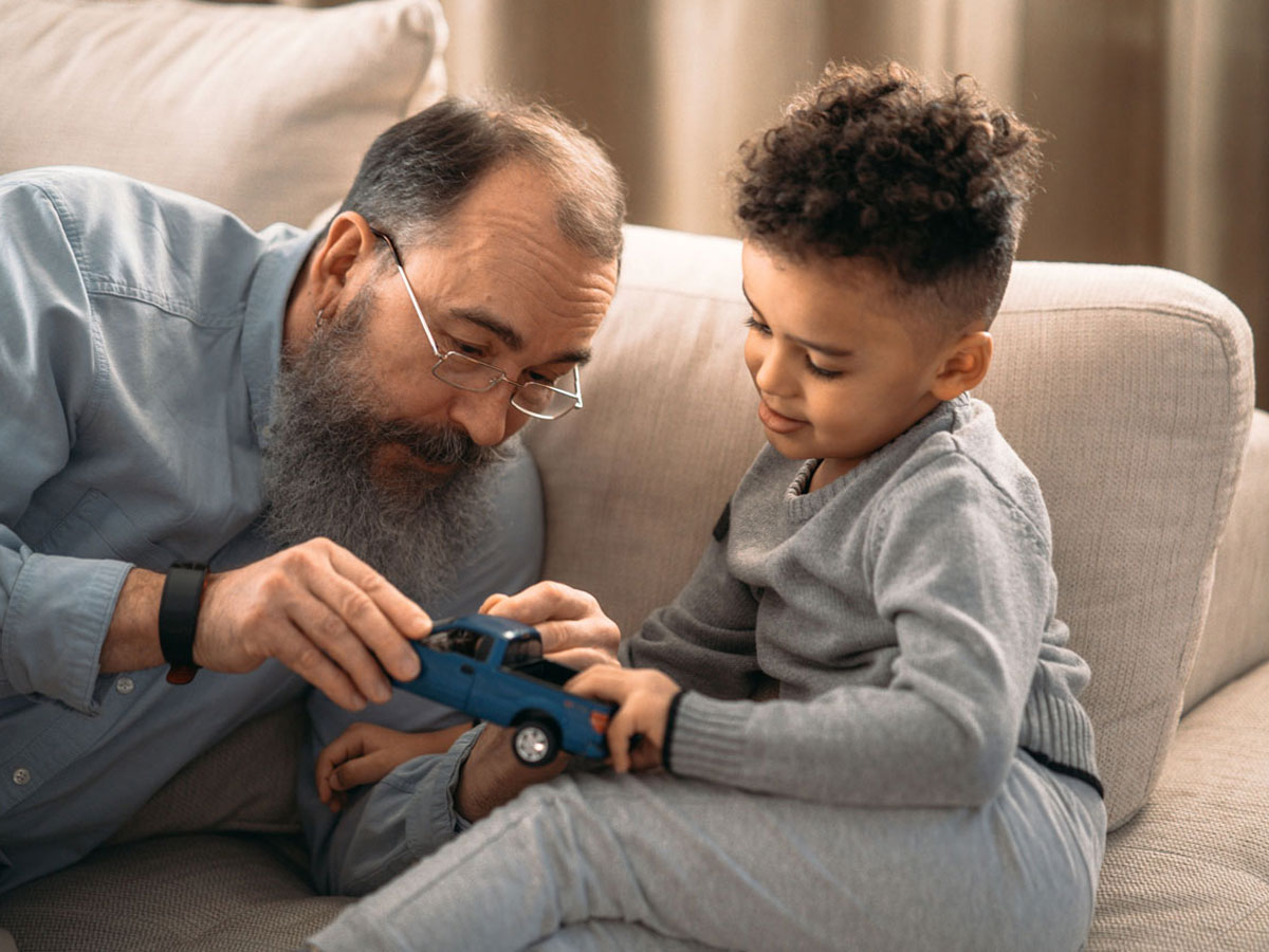 Grandfather with his grandchild — Klea Pharma helps bring quality pharmaceuticals to patients across the Middle East and Africa